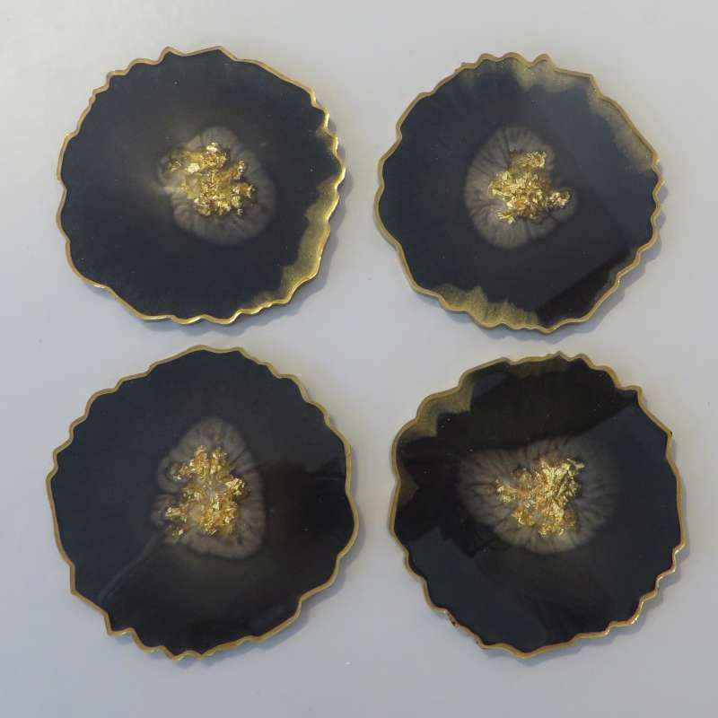 Black and gold round coasters